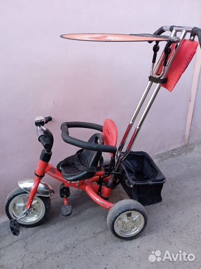 Трёхколёсный велосипед с родительским управлением