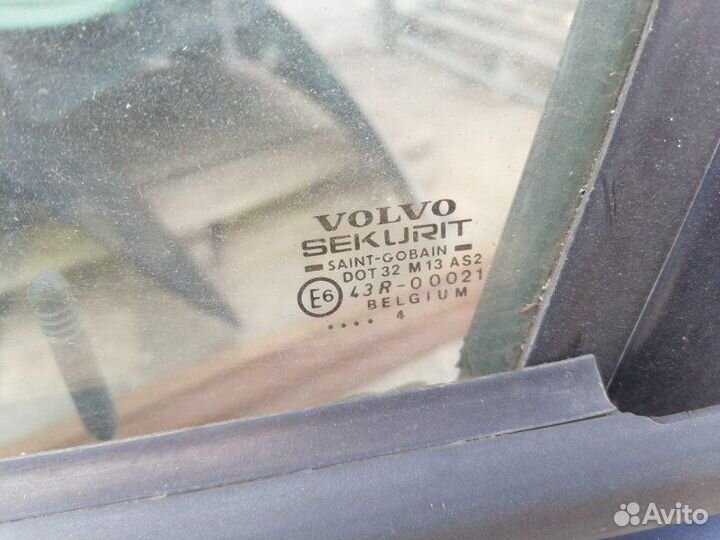 Стекло двери переднее левое Volvo 460