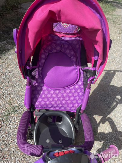 Трехколесный велосипед с ручкой