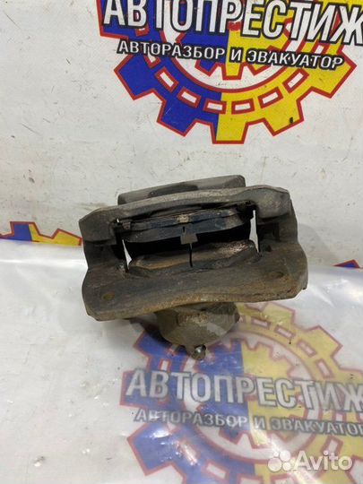 Суппорт тормозной передний левый Toyota Rav4