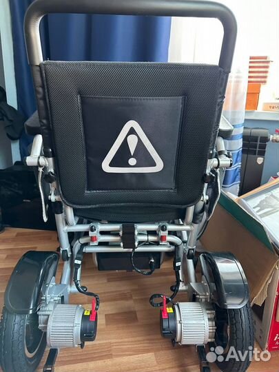 Электрическая инвалидная коляска