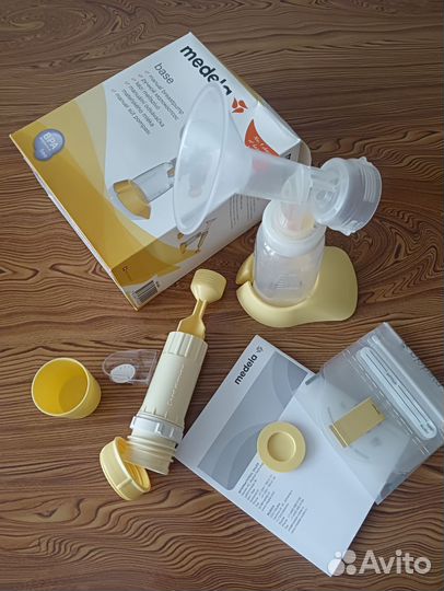 Молокоотсос medela