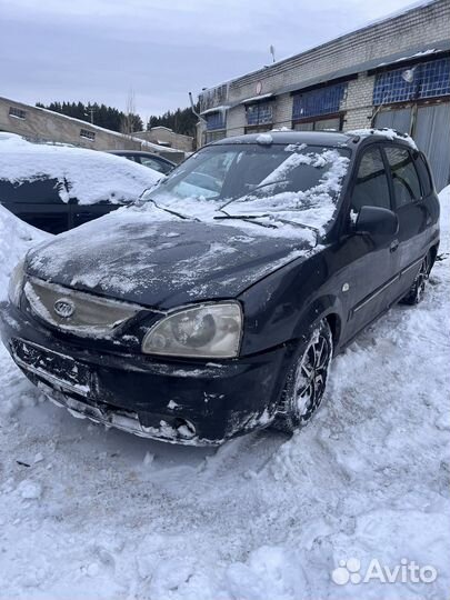 В разборе Kia Carens