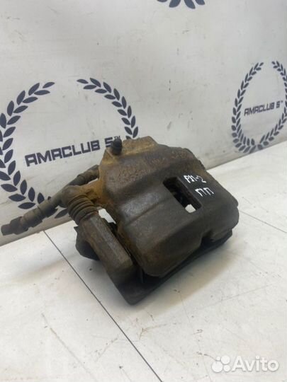 Суппорт передний правый Nissan Primera P11 1.6