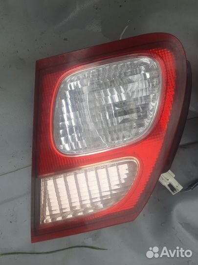 Задние фонари в крышку багажника