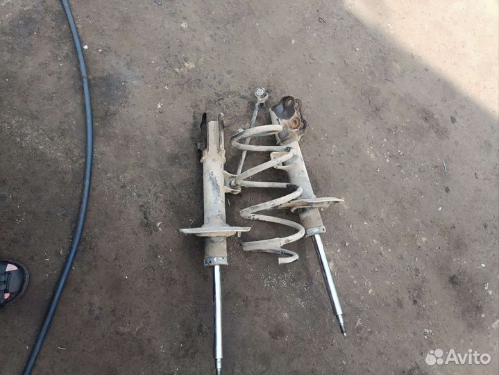 Передние стойки на Киа Спортайдж