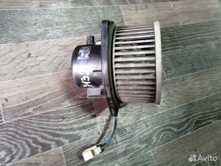 Моторчик отопителя Ниссан Примера Р11