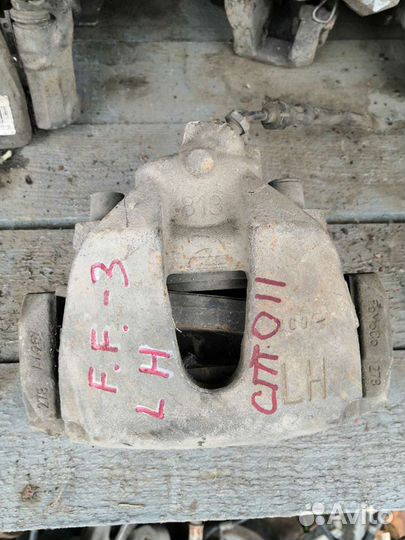 Суппорт передний левый Форд Фокус 3