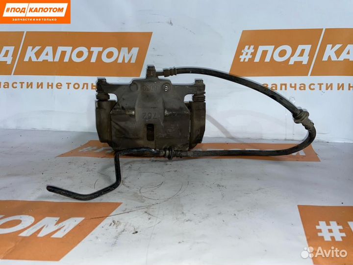 Суппорт тормозной передний левый Nissan X-Trail