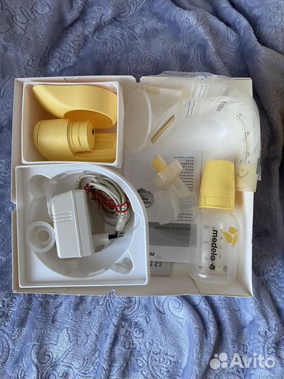 Молокоотсос Medela электрический портативный