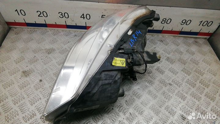 Фара Chrysler Voyager (2007-2010)