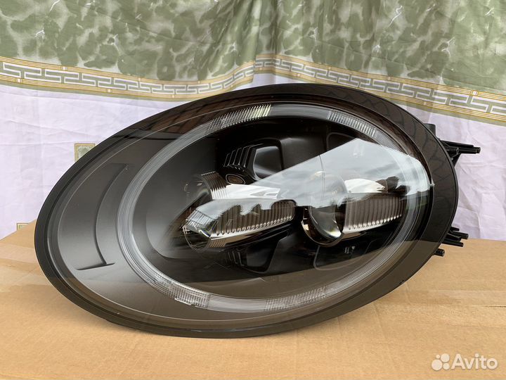 Фара правая Porsche 911 99163196463