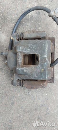 Суппорт левый Toyota Corolla, Fielder, Allex-Runx