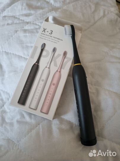 Электронная зубная щетка