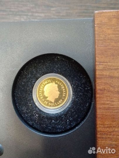 Коллекционная золотая монета