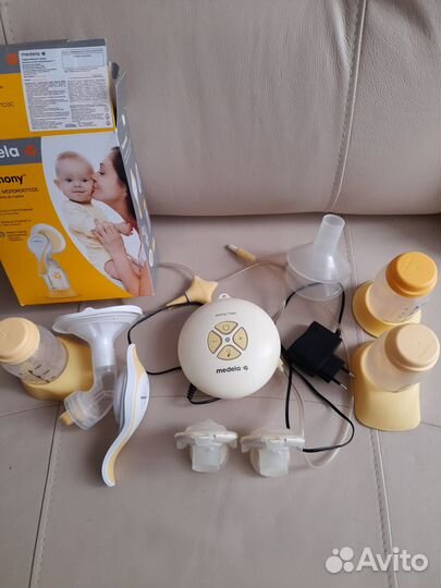 Молокоотсос medela swing maxi