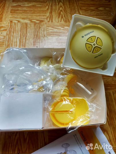 Молокоотсос электрический двойной medela swing