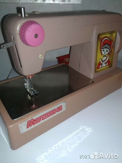 Детская швейная машинка малютка