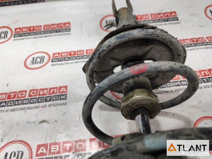 Стойка передняя левая nissan wingroad