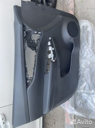 Обшивка водительской двери X-Trail