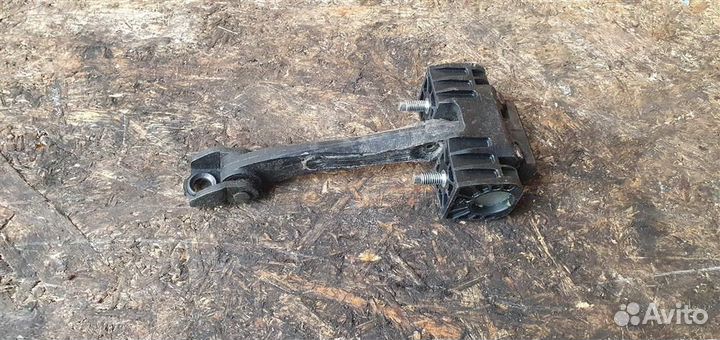 Ограничитель двери задний Opel Astra H 2004-2014