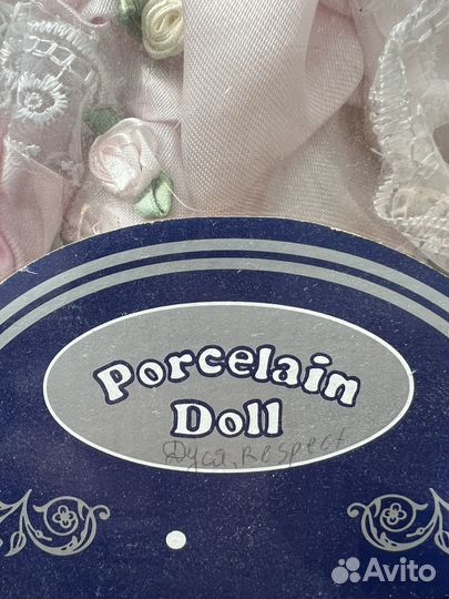 Кукла фарфоровая