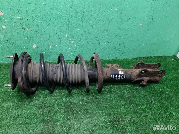 Стойка амортизатора передняя левая Suzuki Grand V