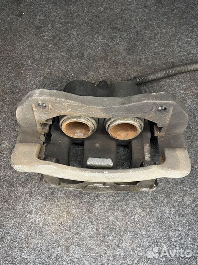 Тормозной суппорт hyundai santa fe левый передний