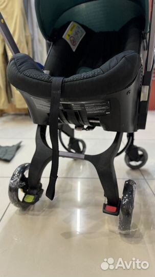 Коляска автокресло doona с базой isofix