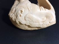 Ухо кита. Фигурка из кости с изображением кита