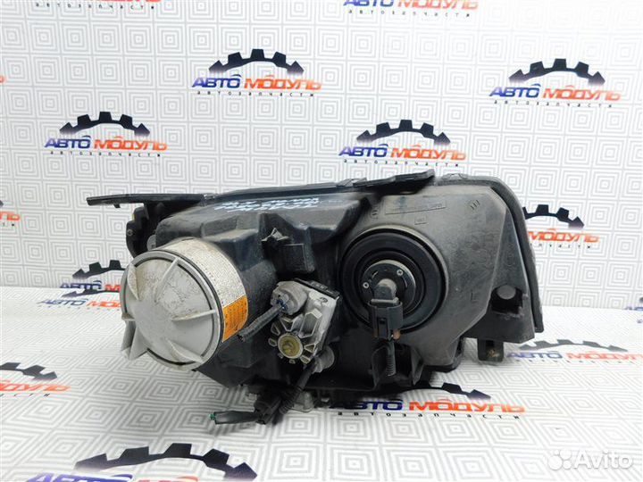 Фара левая Suzuki Escudo TDA4W-201246 J24B 2009