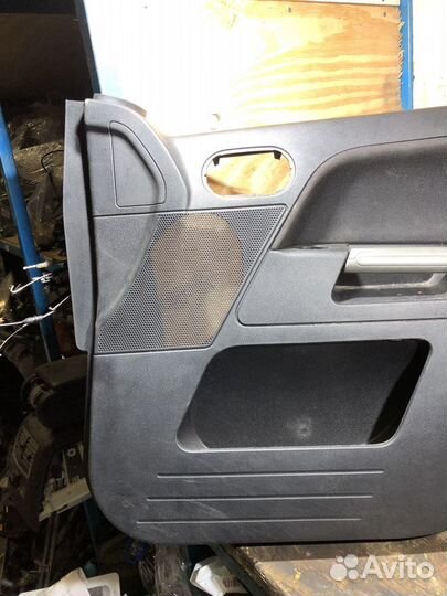 Обшивка передней правой двери Ford Fusion 79032