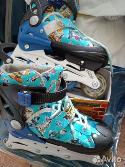 Роликовые коньки