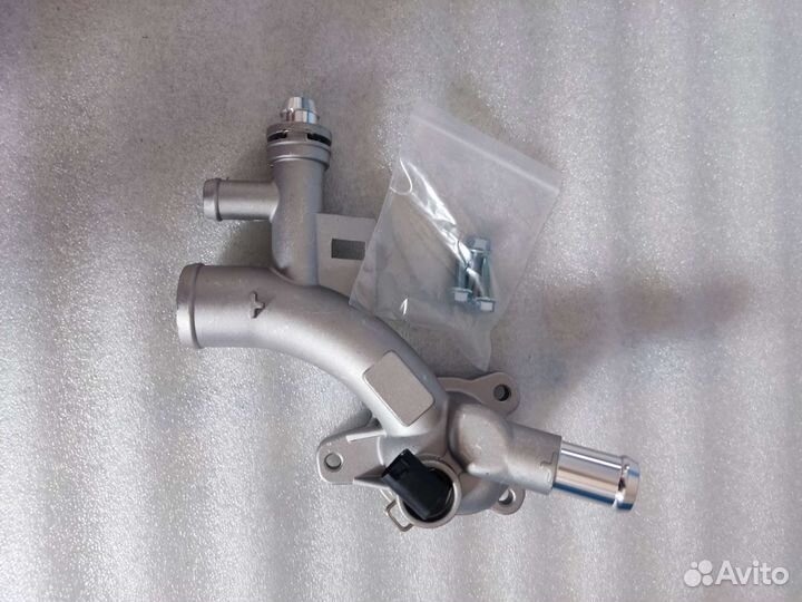 Корпус термостата Opel 1.4t тройник