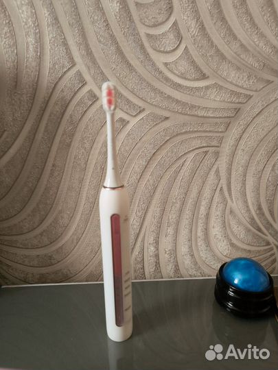 Электрическая звуковая зубная щётка