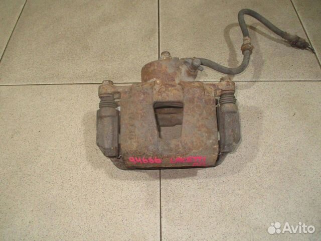 Суппорт передний левый Chevrolet Lacetti