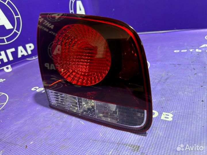 Фонарь в крышку багажника левый Volkswagen Touareg