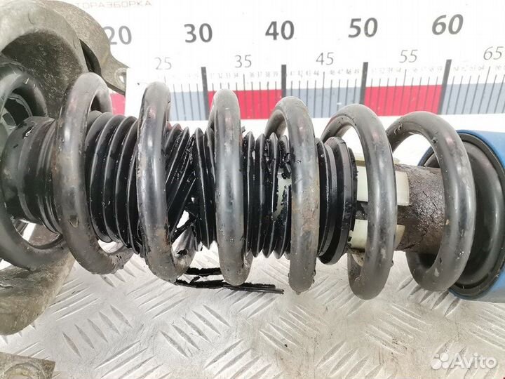 Б/У Б/У Стойка амортизатора заднего левого