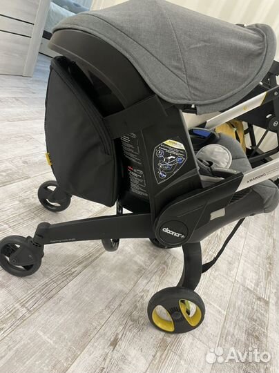 Коляска автокресло doona plus с базой изофикс