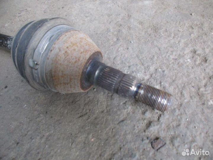 Полуось передняя левая Opel Astra H / Family 2004