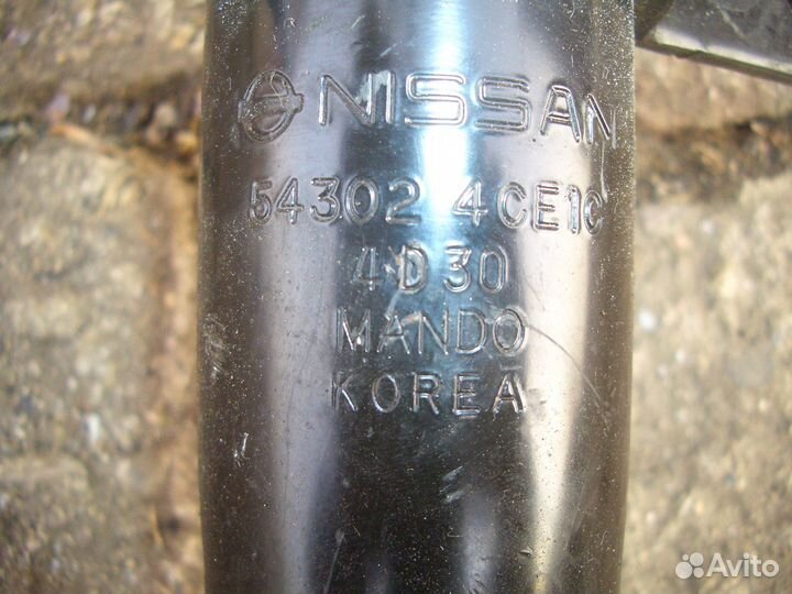 Амортизатор передний правый Ниссан Х-Трейл с14