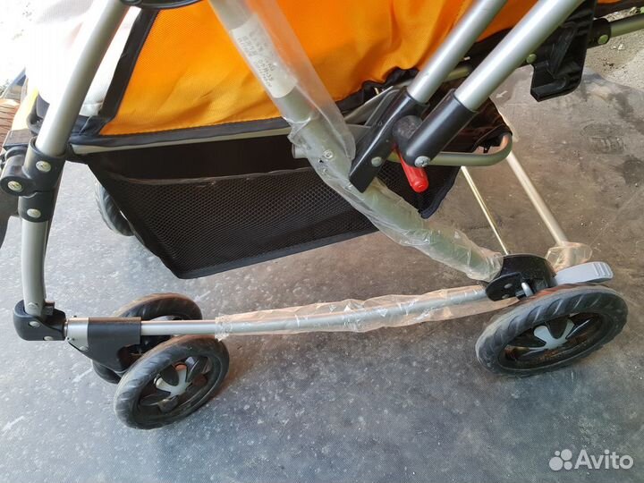 Коляска прогулочная с перекидной ручкой оранжевая