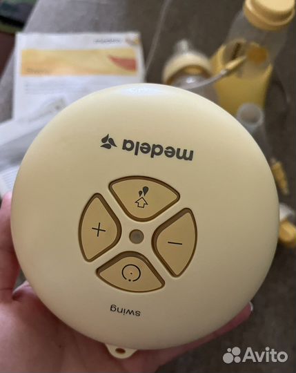 Молокоотсос medela электрический