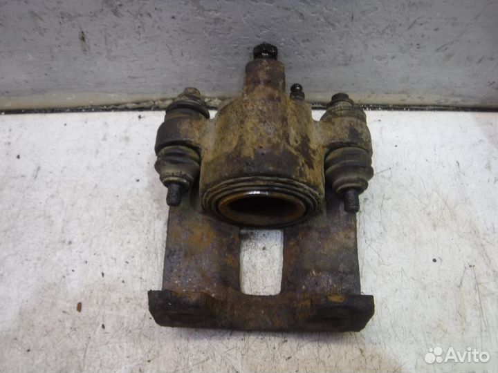 Суппорт тормозной задний Ford Explorer