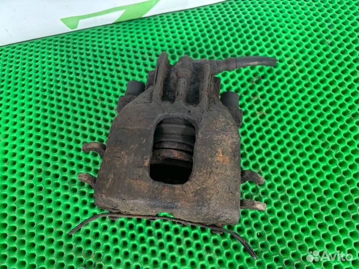 Суппорт тормозной передний левый Ford Focus 1 1.6