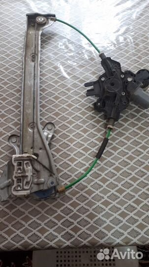 Стеклоподъемник Королла е 210