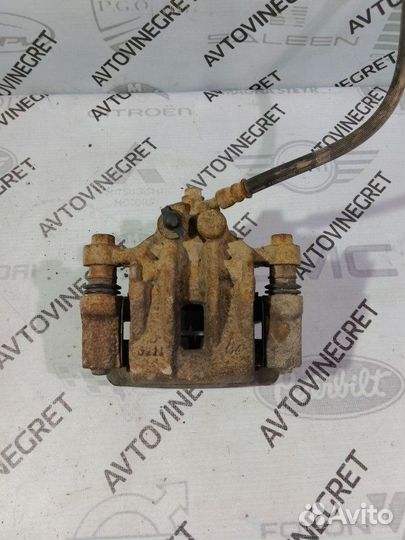 Суппорт тормозной задний Kia Cerato 1