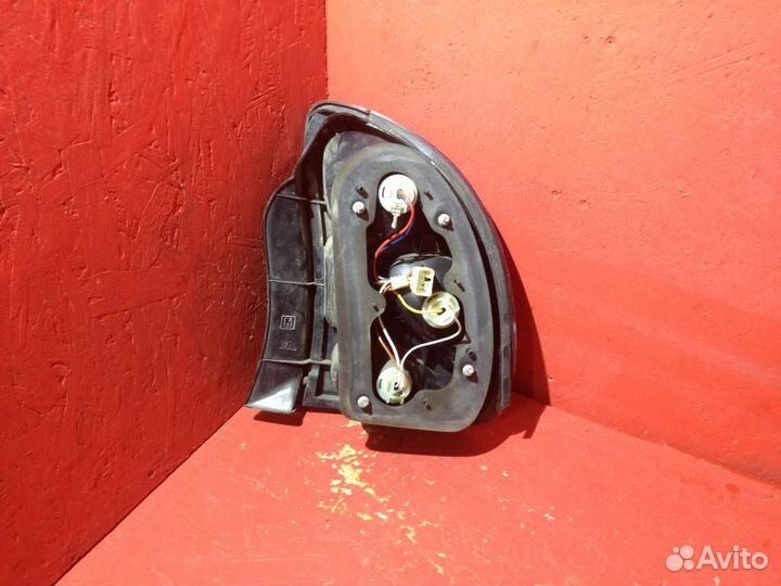 Фонарь задний левый Шевроле Ланос