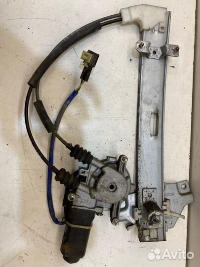 Мотор стеклоподъемника задний правый Kia Spectra