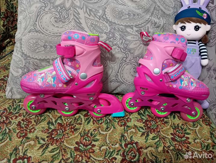 Роликовые коньки